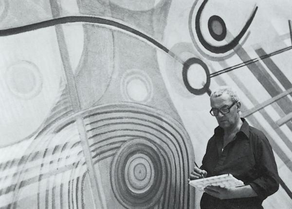 Serge Brignoni durante l’esecuzione del dipinto murale “Le Onde”, sede RSI di Comano, Fotografia del 1975; Fonte: Giuseppe Curonici, Serge Brignoni, Editions Galerie “zem Specht”, Basilea 1980, p. 35: ill. n. 69.
